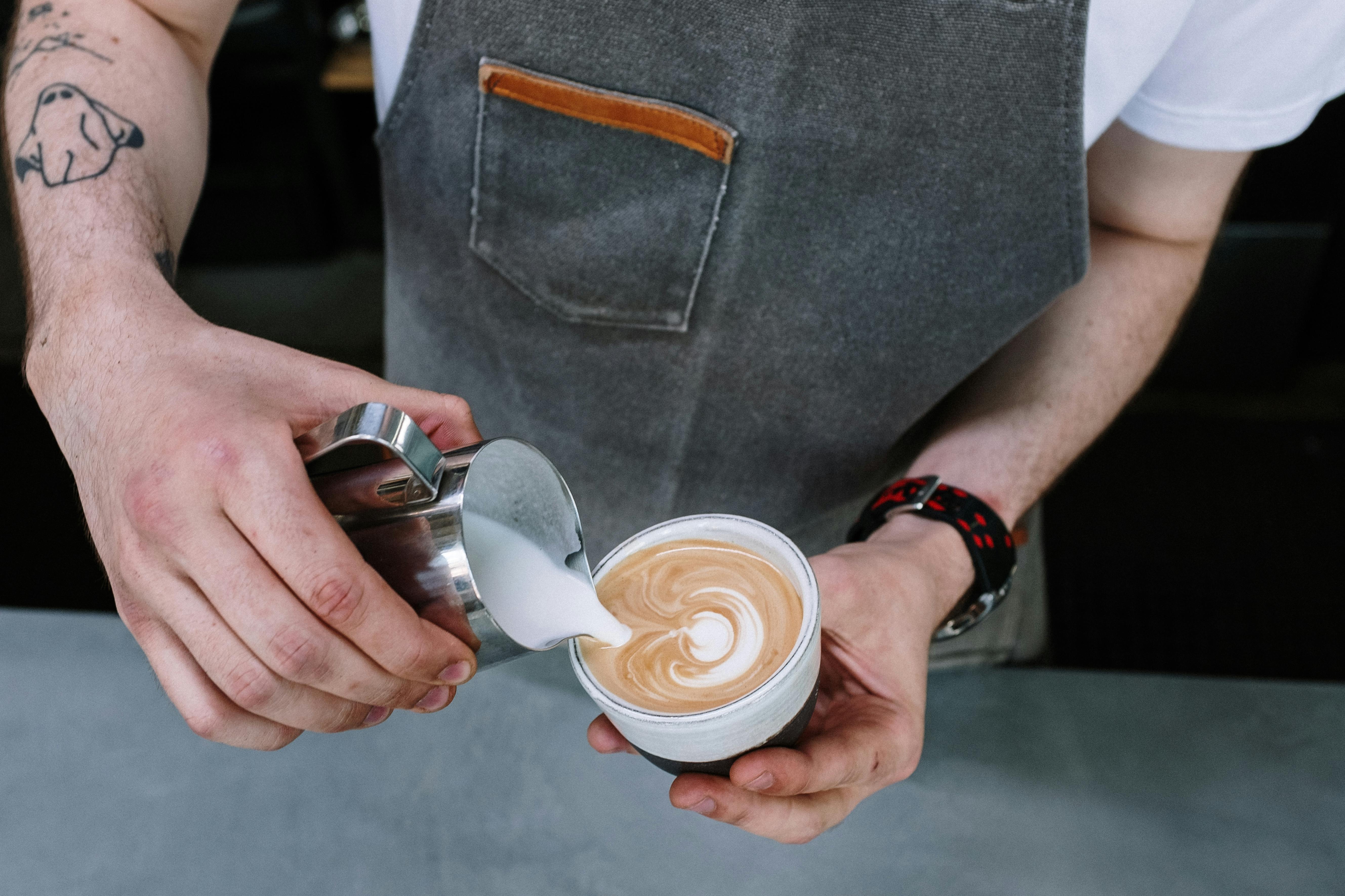 Barista creating latte art